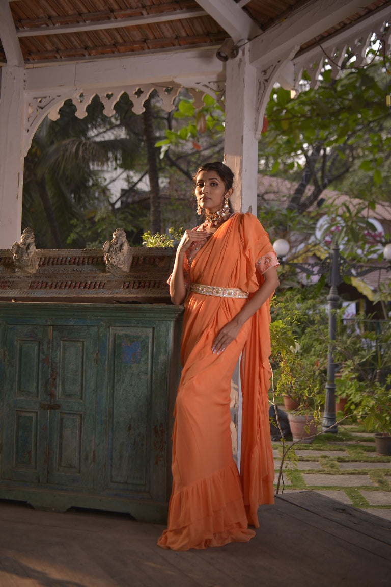 Cantaloupe orange printed blouse with saree
